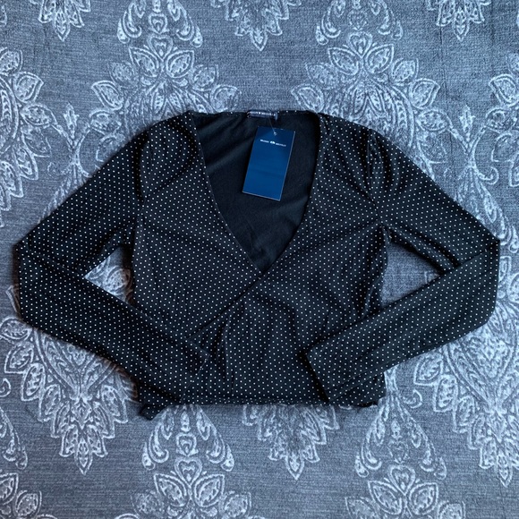 Brandy Melville Tops - Brandy Melville Black Polka Dot Wrap Crop Top